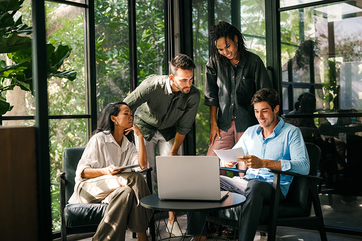 A startup team reviewing a digital MVP.